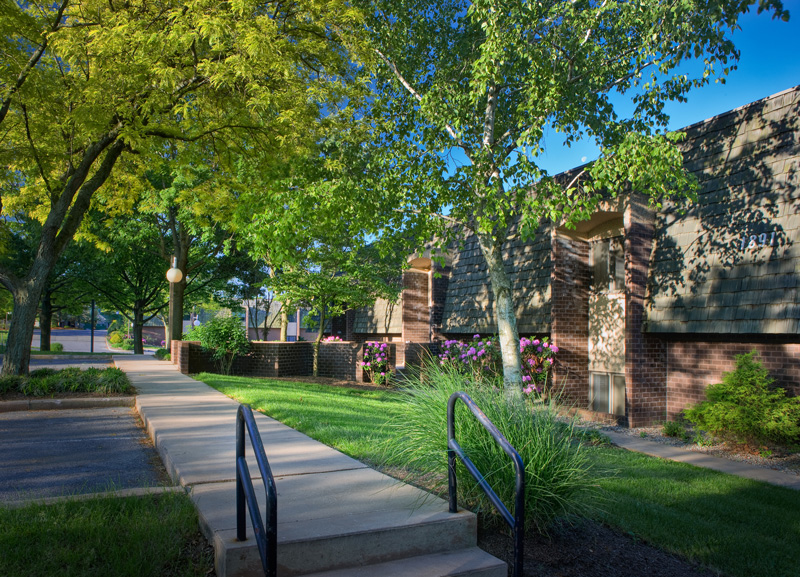 Outside view of Compass Mark's suburban office building in springtime.